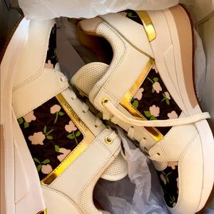 Beautiful Michael Kors wedged sneakers that were NEVER worn!!!